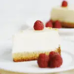 two cheesecakes with raspberries