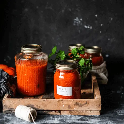 tomato vodka sauce in two containers